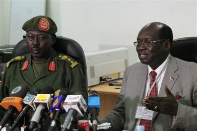 South Sudanese Minister of Information Barnaba Benjamin Marial, right, and Military Spokesman Philip Aguer brief the media on Tuesday, March 27, 2012 (AP)