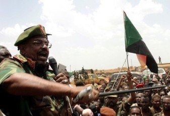 Sudanese President Omar al-Bashir addresses celebrating troops during his visit to Sudan's main petroleum centre of Heglig on April 23, 2012