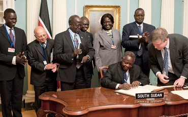 South Sudanese finance officials at signing of the treaty to become World Bank/IMF's newest member (AFP File photo)