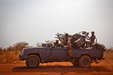 A picture taken on April 15, 2012, shows soldiers of the Justice Equality Movement (JEM) travelling along the only main road of Heglig (Getty)