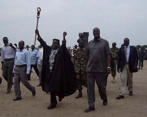 The speaker of the South Sudan’s national assembly, Wani Igga, holding up is stick while waving at the people at the rally in Bor freedom square, June 28, 2012 (ST)