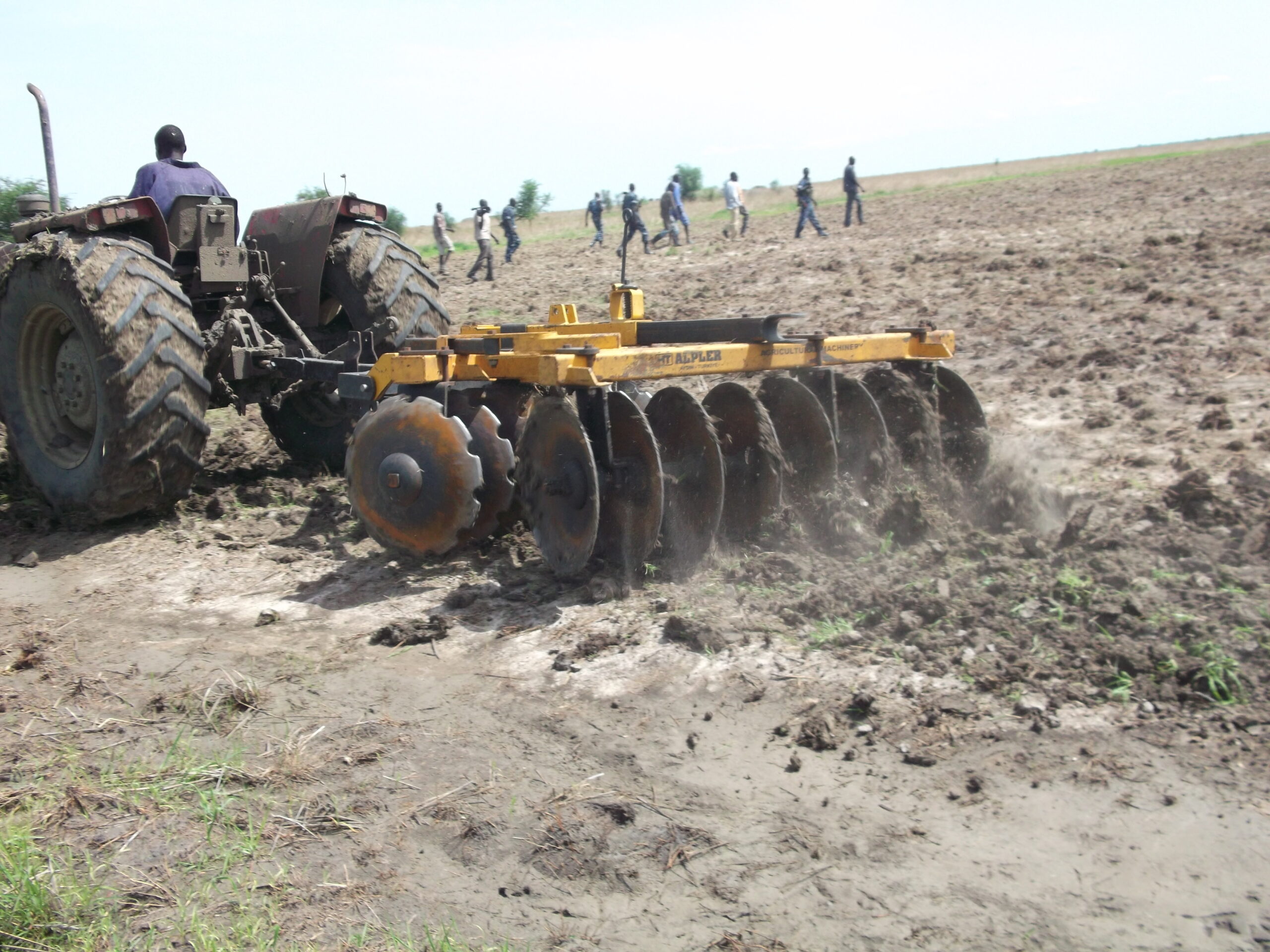 A tractor driver ploughs a field at Waat Mechanized Model Farm, Nyirol County, Jonglei, South Sudan, June 1, 2012 (ST)
