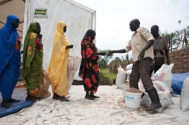 Refugees from Blue Nile receive food during a food aid distribution at the Yusuf Batil Refugee camp, in Upper Nile State, South Sudan on June 23, 2012. (Getty