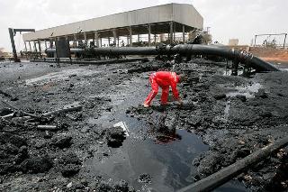 A Sudanese worker inspects the damage to an oil-processing facility in Heglig. South Sudan seized Sudan’s main oil field in the town in April, sparking intense fighting. Under strong international pressure, South Sudan withdrew, April 23, 2012 (AFP/Getty)