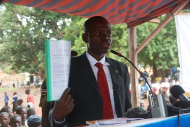 Western Equatoria state Governor, Joseph Bakosoro displays the Girls' Education Bill during the yearbook launch, June 22, 2012 (ST)