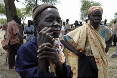 People displaced by fighting in Abyei wait to be registered at a UN WFP distribution point in the village of Abathok (file photo Reuters)