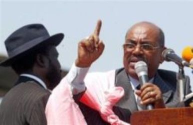 Omer al-Bashir (Right) speaks in Juba, with Salva Kiir (Left), during the 2nd anniversary celebration of the signing of the 2005 peace agreement, Jan 9, 2007. (AP)