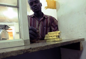 Gold bullion blocks, brought by local gold workers for examination, are pictured at a gold laboratory counter in the gold market in Khartoum July 15, 2012 (Reuters)