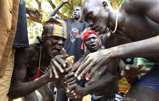 Lakes state citizens perform traditional dance (Reuters)