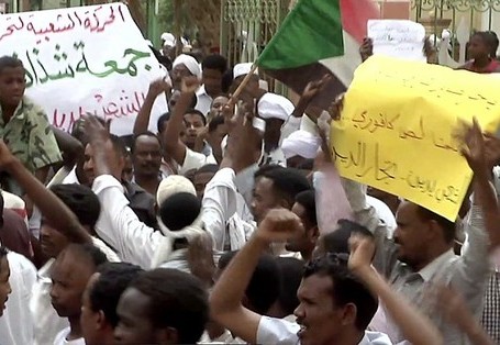 Sudanese demonstrators shouting anti-regime slogans during a protest outside the Wad Nabawi mosque in Khartoum's twin city of Omdurman on July 6, 2012. (Getty)