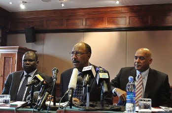 South Sudan’s chief negotiator, Pagan Amum (L) sits alongside Sudan’s Defence Minister Abdel-Rahim Mohamed Hussein (C), Sudanese spokesman Omer Dahab (R) as they announce that both countries have agreed to improve ties and cease hostilities during the latest round of talks in Addis Ababa on July 7, 2012 (GETTY)