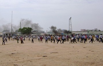 Smoke billows from burning tires as Sudanese demonstrators protest against rising prices near the main market of Nyala, the capital of South Darfur state, on July 31, 2012 (GETTY)