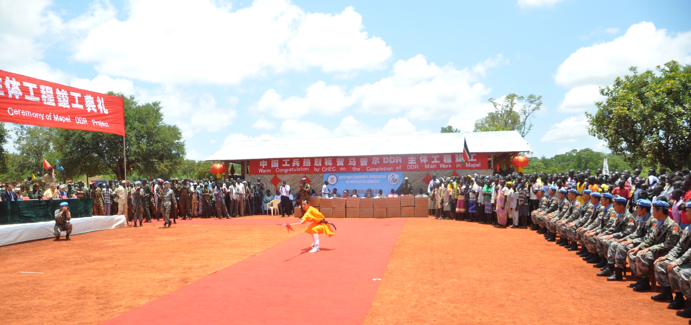 A Chinese man performs sports activities at the inauguration ceremony of Mapel DDR center, Western Bahr El Ghazal, South Sudan, 29 August 2012 (ST)