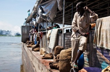 a_south_sudanese_returnee_from_khartoum_sails_on_a_barge_as_he_arrives_at_the_port_in_south_sudan_s_capital_juba_may_16_2012._reuters.jpg