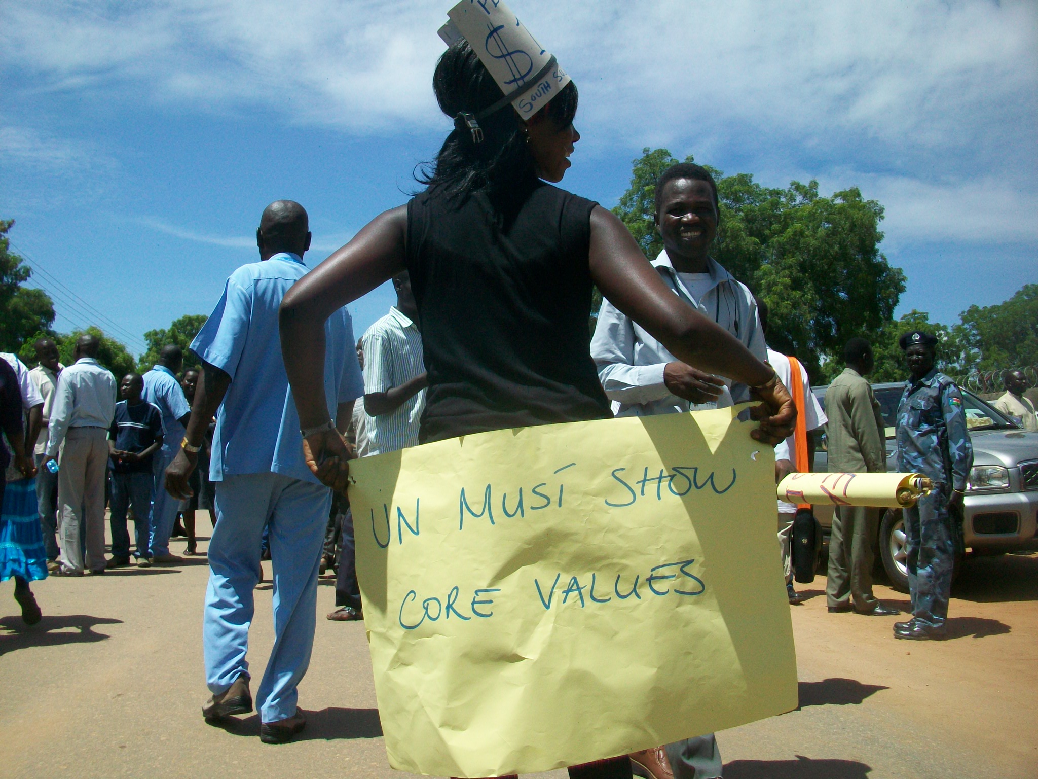 A female staff protests outside the UNDP office premises, August 13, 2012 (ST)