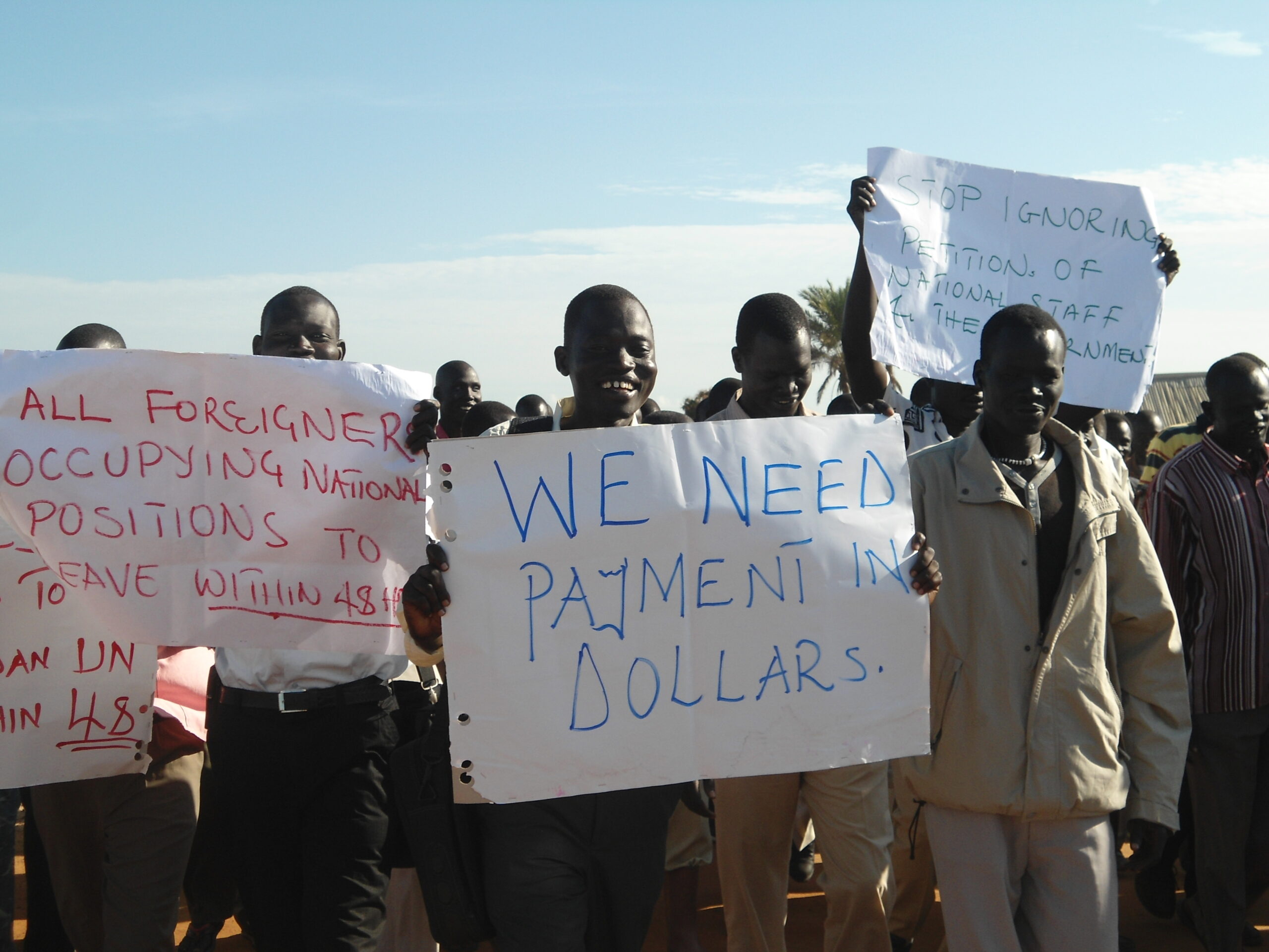 South Sudanese UN staff in Bor hold a strike to demand their salaries in dollars like their international counterparts at a strike. 14 August 2012 (ST)