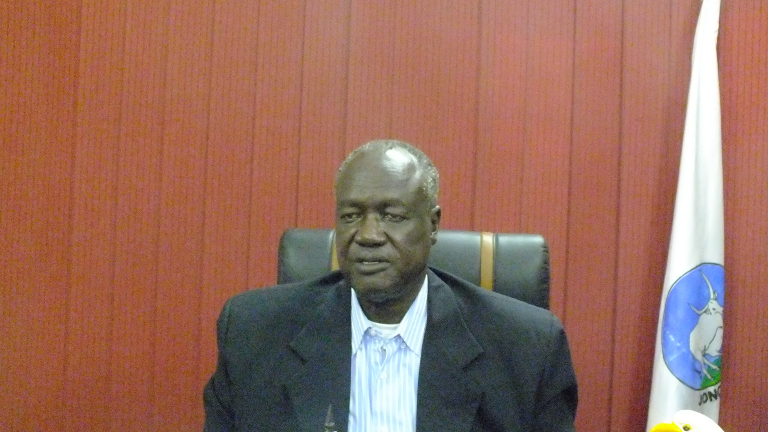 Jonglei State Governor Kuol Manyang Juuk announces the new attacks by David Yauyau's rebels in his office in Bor, 30 August 2012 (ST)