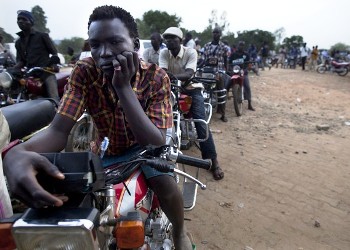 Motorcycles line up for hours to get fuel before it runs out July 18, 2012 in Juba, South Sudan. (Getty)