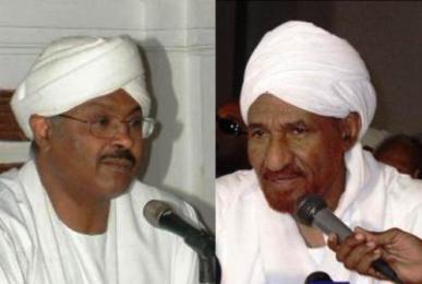 Mubarak Al-Fadil Al-Mahdi leading figure in the National Umma Party (NUP), left and his cousin the NUP chief al-Sadiq Al-Mahdi, right.