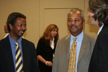 Ted Dagne, (L) late Congressman Payne and John Prendergast of ENOUGH at a meeting on Darfur crisis in 2008 (file photo Enough Project)