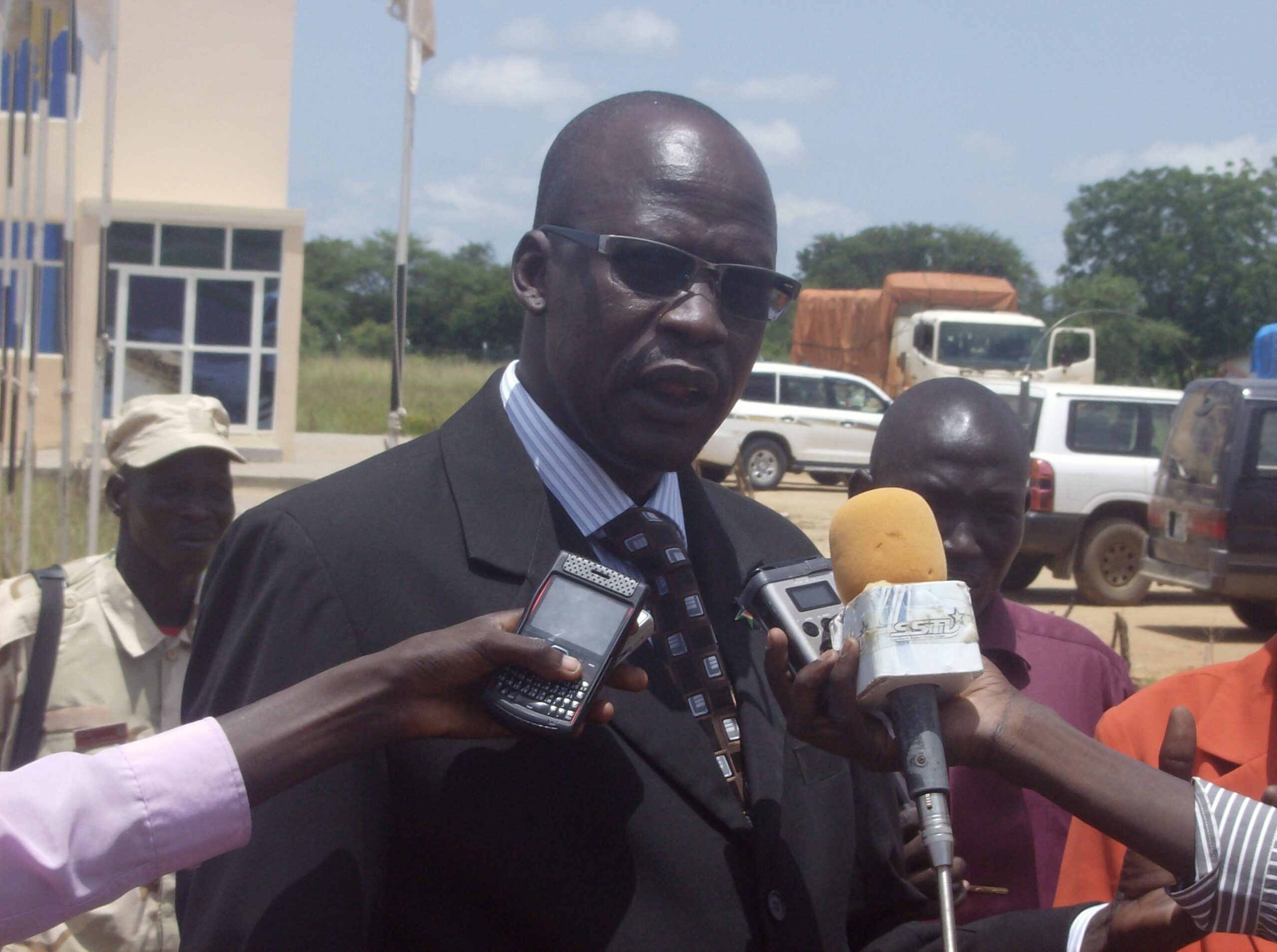 The commissioner of Uror County, Simon H. Duoth, speaking to the press at Bor Airport, September 13, 2012 (ST)