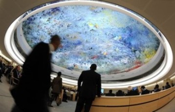 Delegates are seen beneath a ceiling painted by Spanish artist Miquel Barcelo during a special session of the UN Human Rights Council on on (December 2, 2011)