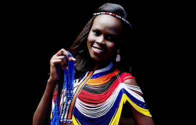 Miss World contestent, South Sudan's Atong Demach, poses for a photo as she waits backstage prior to a rehearsal for the final ceremony at the Ordos Stadium Arena in the inner Mongolian city of Ordos on August 17, 2012. (Getty)