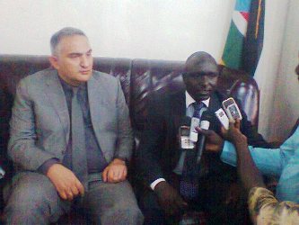 Murat Ersoy, Atasjet airline President (L) and Ronald Ruay  Deng, Northern Bahr el Ghazal's Trade and Investment minister,  September 26, 2012 (ST)