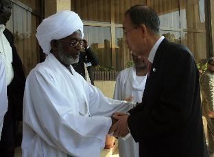 FILE PHOTO - Sudanese Foreign Minister Ali Karti (L) meets with UN Secretary General Ban Ki-moon at Khartoum, Sudan on July 8, 2011. (XinhuaMohammed Babiker)