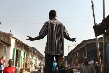 A man speaks with merchants in a market in Juba on January 6, 2011 in (Getty)