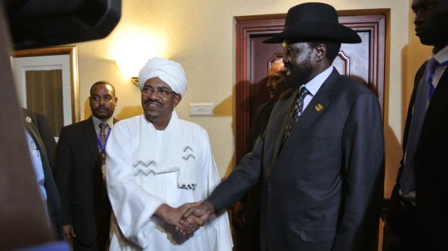 FILE PHOTO - Sudan's President Omer Al-Bashir and his South Sudanese counterpart Salva Kiir Mayardit