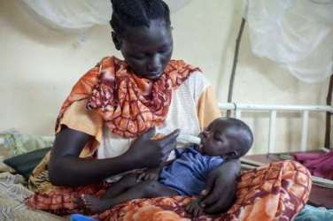 South Sudanese women and her child (photo UNHCR)