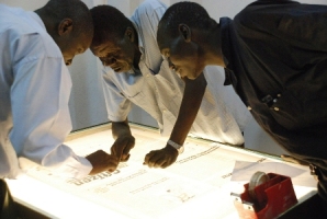 The layout team prepares an edition of The Citizen newspaper, an English language daily, at their offices in the southern Sudanese capital of Juba on January 28, 2011.  (Peter Martell/AFP/Getty Images)