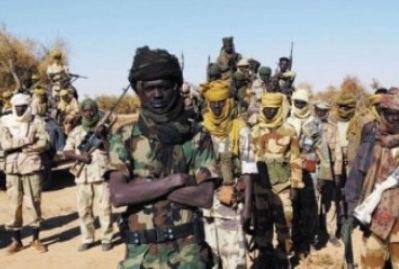 File phot showing Minnawi posing with his fighters in Darfur