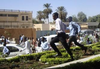 Sudanese students run during a demonstration in the capital, Khartoum, on 9 December 2012, as they rallied in support of four dead students originally from the conflict-plagued Darfur region (Photo: Getty Images)