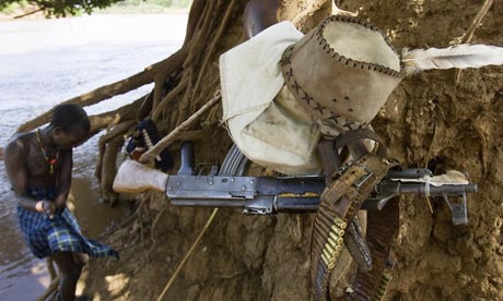 A member of the Karo tribe by the Omo river in Ethiopia. Three hydropower dams are planned - there are fears that the resulting scarcity could lead to violent conflict (Getty)