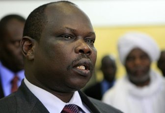 South Sudan's chief negotiator Pagan Amum speaks to a reporter after arriving at Khartoum Airport December 1, 2012 Photo By MOHAMED NURELDIN ABDALLAH/REUTERS