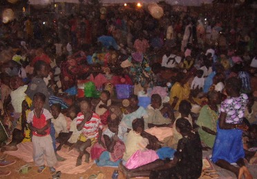 Civilians displaced by the violent protesting in Wau seek refuge in the UNMISS camp, December 19, 2012 (ST)