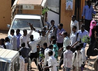Sudanese students demonstrate in front of the Faculty of Computer Sciences and Information Technology in Port, Sudan (AFP/File)