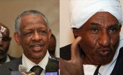 Sudanese presidential assistant Nafie Ali Nafie (L) and leader of National Umma Party (NUP) Al-Sadiq Al-Mahdi (R)