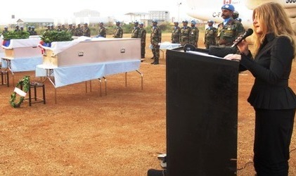 UNMISS head Hilde F. Johnson speaks during a memorial ceremony for the Russian crew of the Russian helicopter that crashed in Jonglei on 21 December. The ceremony took place this morning, 24 December, at UNMISS compound in presence of the SRSG and other colleagues. (UNMISS)