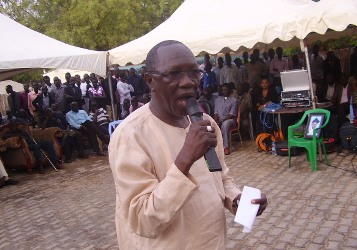 South Sudan Human Rights Commission chairperson, Lawrance Korbandy, speaks at prayer service for the late Isaiah Abraham, December 16, 2012 (ST)