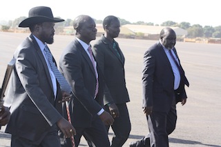 South Sudan President Salva Kiir (Left) accompanied by the Western Bahr el Ghazal Governor Rizik Zachariah Hassan (C) and Nyandeng Malek of Warrap on December 24, 2012 (ST)