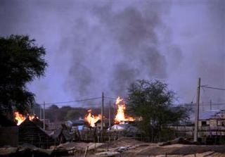 Smoke rising from burning homes in the center of Abyei town, May 11, 2011 (UN)
