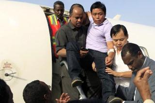 Four Chinese workers who were abducted in the Darfur region were returned to Khartoum in January 2013 (Photo: Reuters)