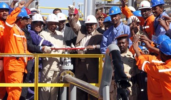A December 27 , 2012 file photo shows Sudan’s President Omar al-Bashir (C) inaugurating the Hadida oil field located on the border between East Darfur state and South Kordofan, the country’s main oil-producing area (Getty Images)