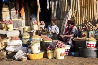 Women sell food at Konyo Konyo market in South Sudan (Reuters)
