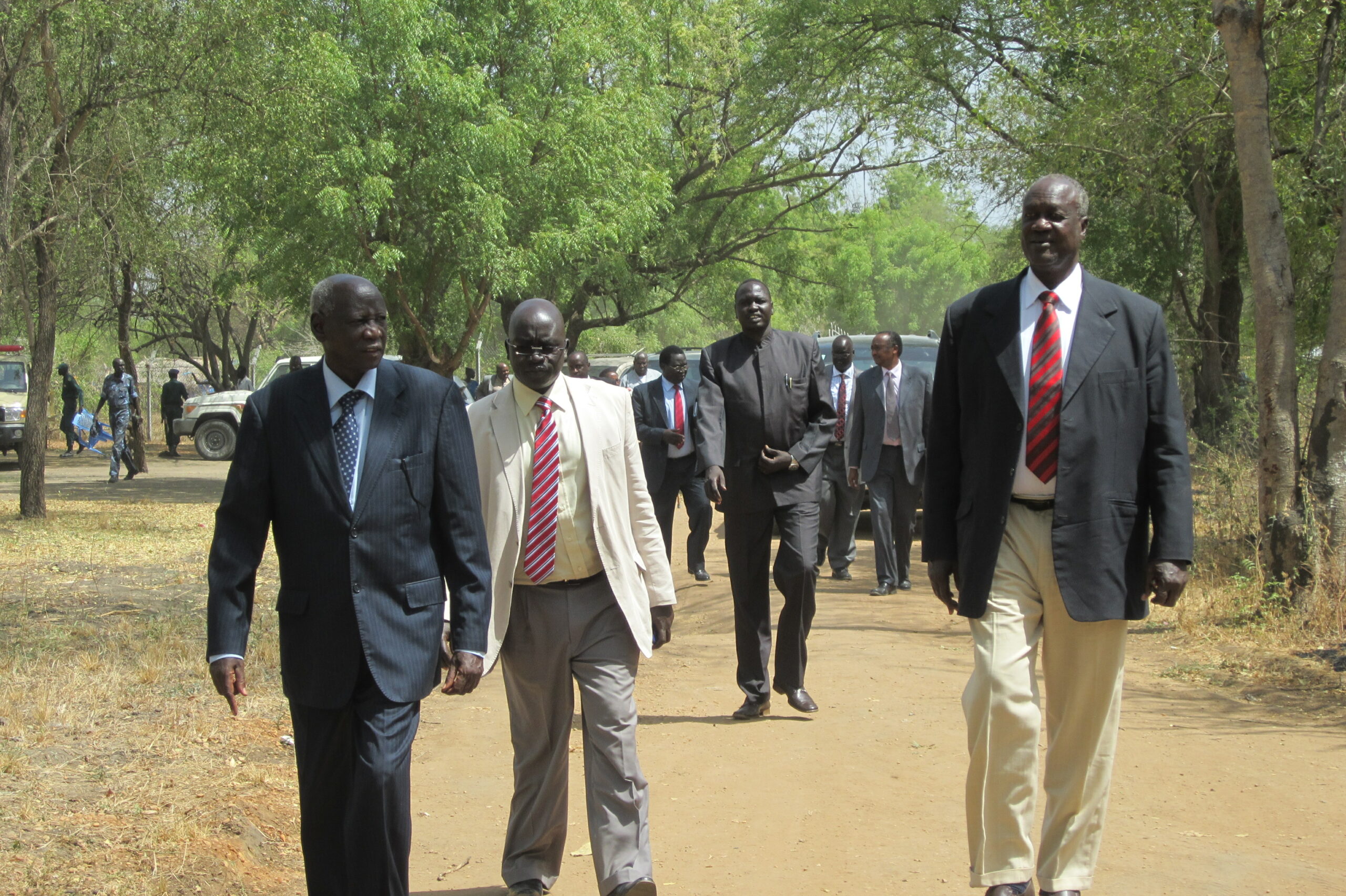 Principal of Malek Academy Garang Aleu (L), deputy governor Hussein Maar Nyuot (C) and governor Kuol Manyang (R) at Malek Academy in Bor, 14 February 2013 (ST)