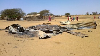 A picture taken on February 22, 2013 shows the remains of a house destroyed in a bombing by Sudan's air force on Derib al Reih village in South Darfur state (Getty Images)