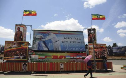 Picture released on Feb 22, 2013 of a large posters of late Prime Minister Meles Zenawi in one of the street in Addis Ababa. If you look around Ethiopia’s capital, it would be hard to know that Meles Zenawi died six months ago, said the AP. (AP Photo/Elias Asmare)